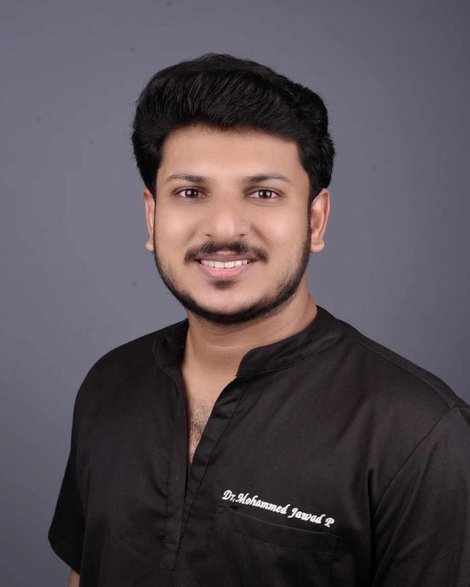 A professional portrait of Dr. Mohammed Jawad P, Chief Dental Surgeon.